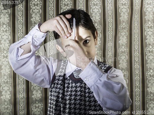 Image of Child vintage clothes decided his hair