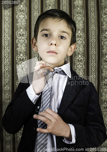 Image of Boy in vintage suit