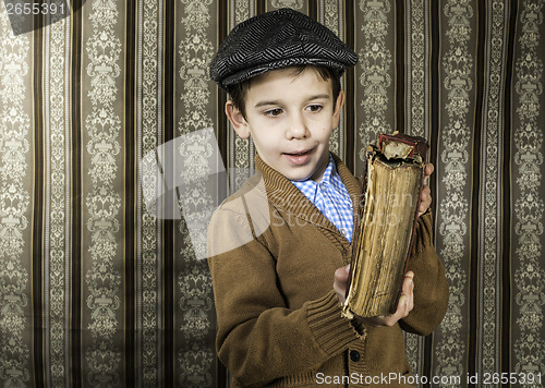 Image of Child with red vintage book