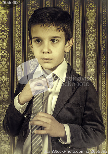 Image of Boy in vintage suit