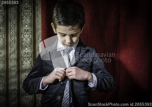 Image of Boy in vintage suit