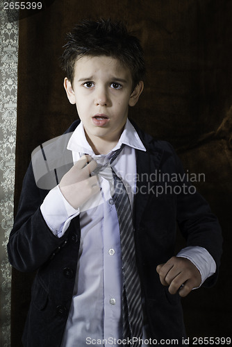 Image of Boy in vintage suit