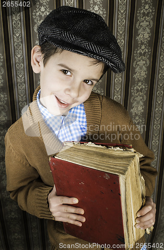 Image of Child with red vintage book