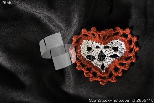 Image of Heart shape made of red textile