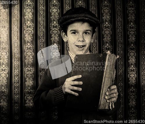 Image of Child with red vintage book
