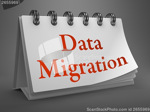 Image of Data Migration Concept on Desktop Calendar.