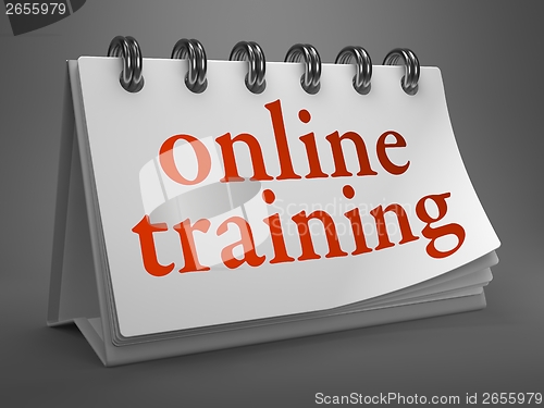 Image of Online Training -Red Word on Desktop Calendar.