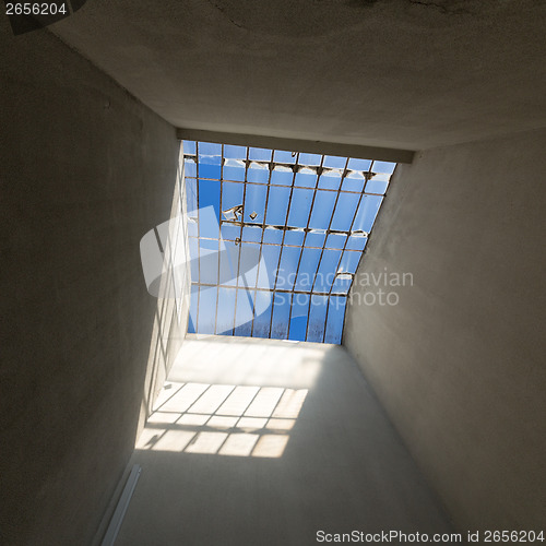 Image of Broken Glass Sunroof in Old House