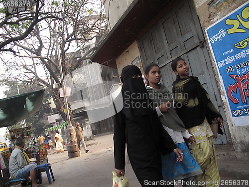 Image of Streets of Kolkata. Muslim woman in burkha