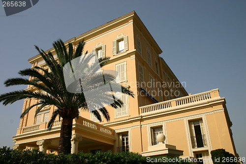 Image of Old aristocratic hotel on the French Riviera with palm tree