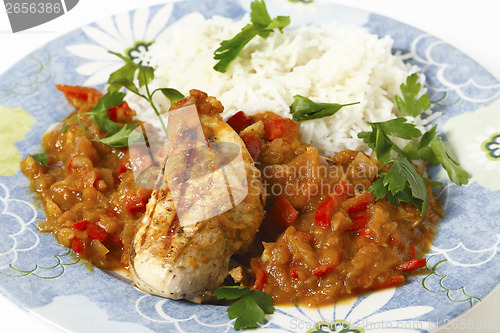 Image of Grilled chicken breast with tomato sauce