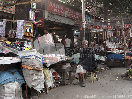 Image of Streets of Kolkata. A street vendor offers his goods