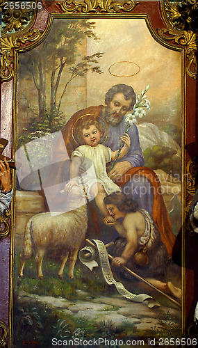 Image of Saint Joseph holding baby Jesus