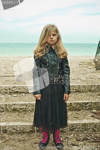 Image of unhappy young girl in black