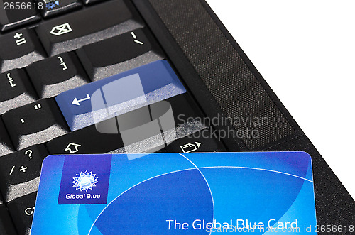 Image of Global Blue plastic card on black ThinkPad keyboard