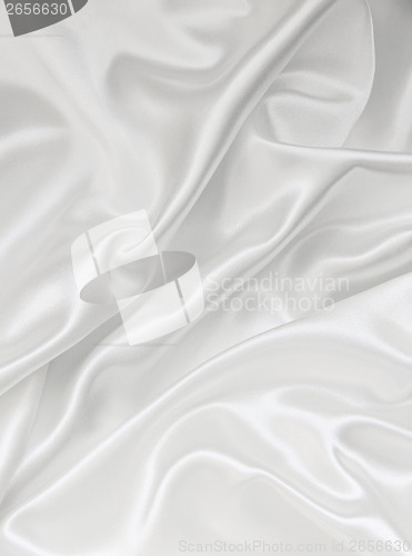 Image of Smooth elegant white silk as background 