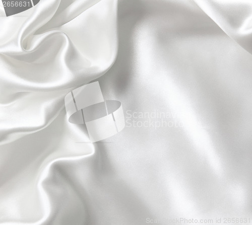 Image of Smooth elegant white silk as background 