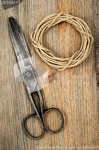 Image of old scissors and hank of packthread