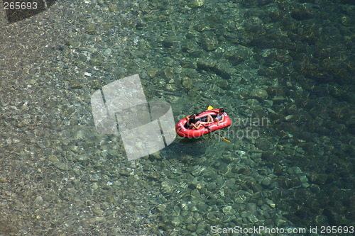 Image of Children in a little boat