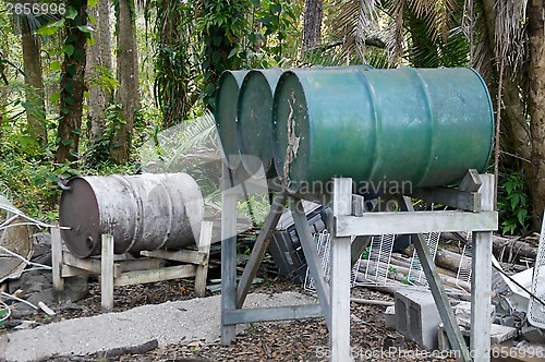 Image of abandoned oil drums