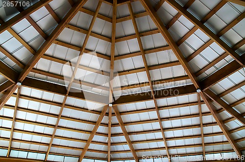 Image of looking up at exposed beam roof