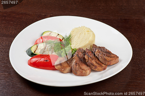 Image of tongue with grilled vegetable