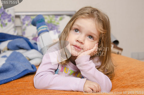 Image of Girl enthusiastically watching TV