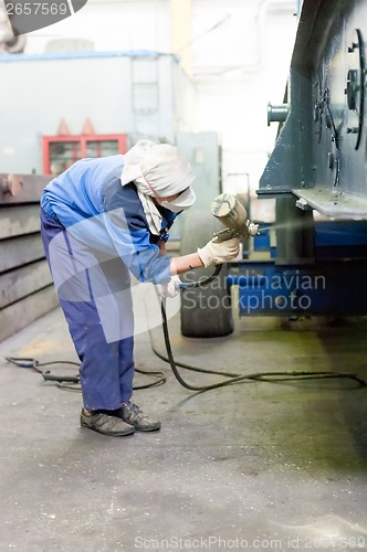 Image of Woman with mask painting device