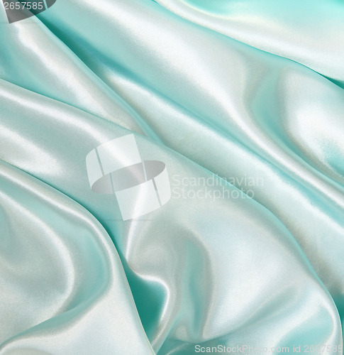 Image of Smooth elegant blue silk as background 