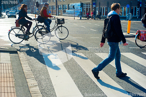 Image of Amsterdam crossing street