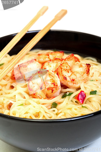 Image of Shrimp and noodle soup bowl with chopsticks