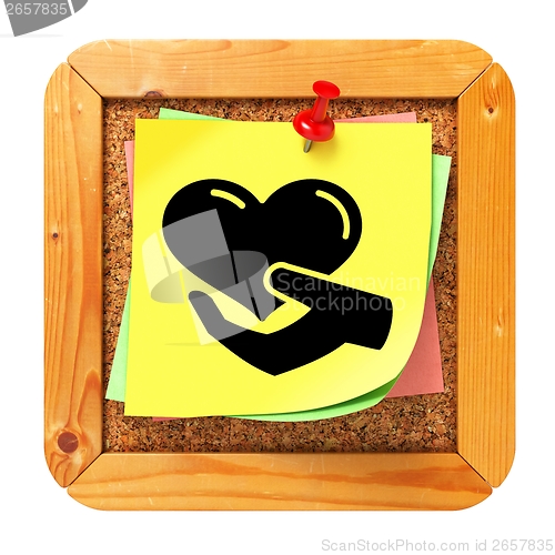 Image of Charity Concept - Yellow Sticker on Message Board.