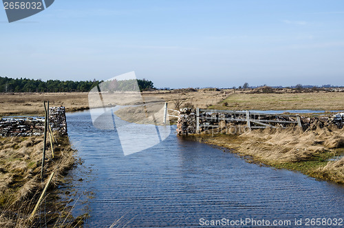 Image of Flooded dirt road