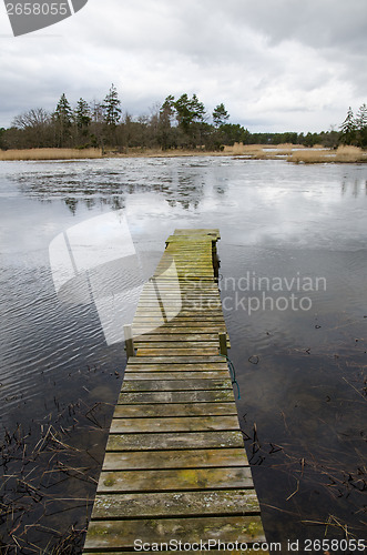 Image of Old jetty at ice break-up