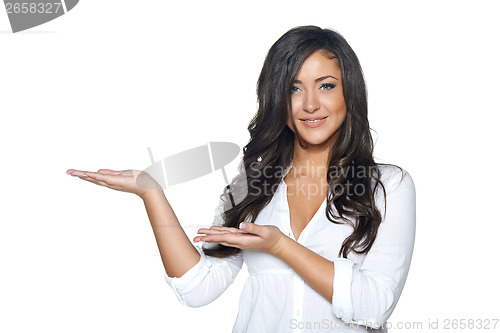 Image of Woman holding blank copy space on her open palm