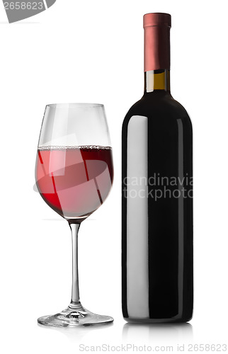 Image of Glass and black bottle of red wine