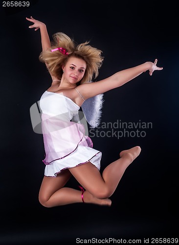 Image of Pretty girl jumping