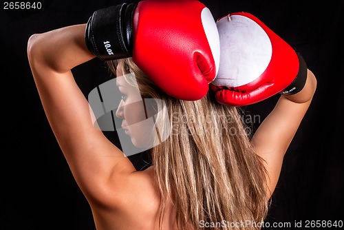 Image of Pretty girl with boxing gloves