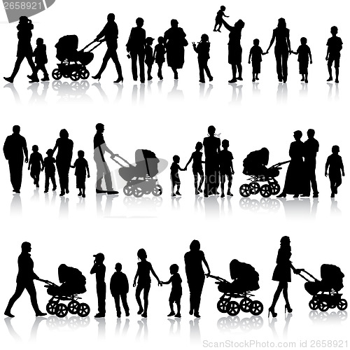 Image of Black set of silhouettes of parents and children on white backgr