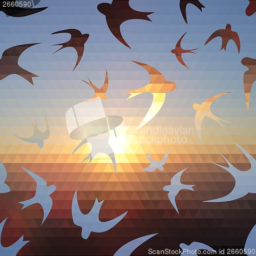 Image of swallow silhouette on triangle sky and sun