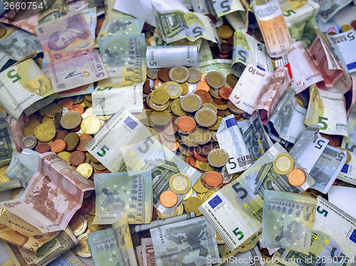 Image of Euro note and coin