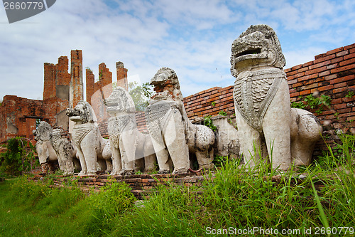 Image of Stone lions in the ruins of an ancient temple. Thailand, Ayuthay
