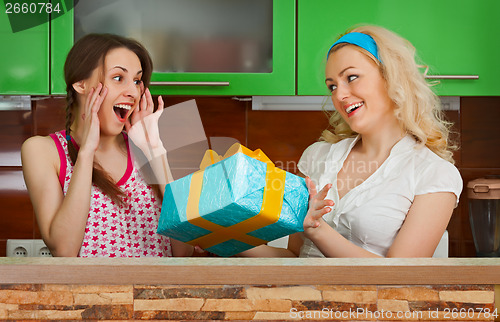 Image of Girlfriend gives a gift at a party