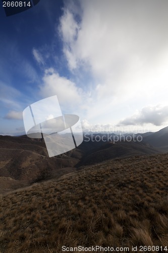 Image of Mountains and blue sky with clouds