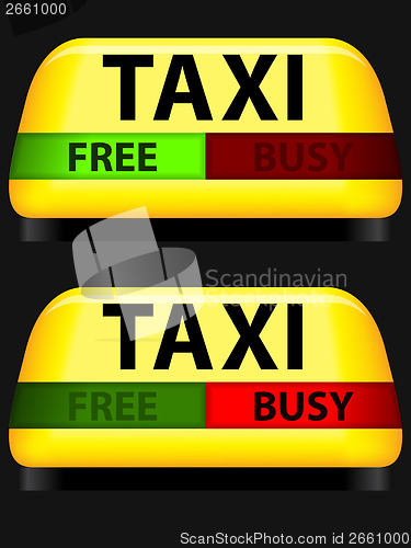 Image of Taxi sign with free and busy lights