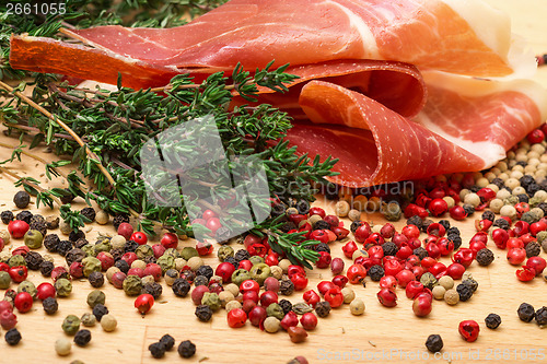 Image of Dry thyme, multicolored peppercorn and hamon