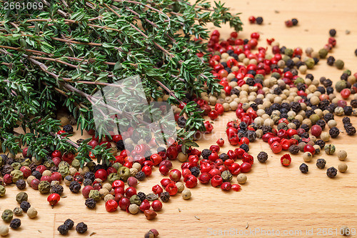 Image of Dry thyme with multicolored peppercorn