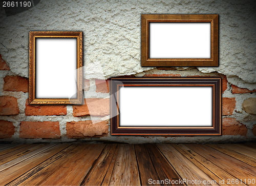 Image of cracked wall with frames