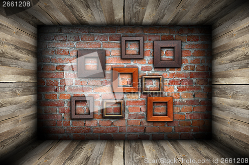 Image of empty room with frames on wall