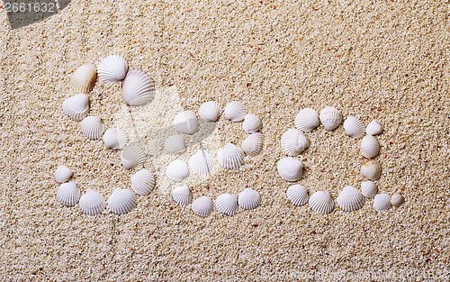 Image of Title "Sea" from shells with coral sand